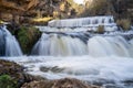 Waterfall at Willow River State Park in Hudson Wisconsin in fall. Daytime long exposure with silky water Royalty Free Stock Photo