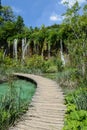 Waterfall and Wooden Path in Plitvice National Park Royalty Free Stock Photo