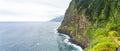 waterfall ,"VEU DE NOIVA" gushing water from the mountain on the island of Madeira and flowing into the Atlantic Ocean