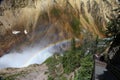 Waterfall in Yellowstone National Park with double rainbow Royalty Free Stock Photo