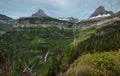 Waterfalls Along Going-To-The-Sun Road with Reynolds Mountain and Clements Mountain in the background Glacier National Park Royalty Free Stock Photo