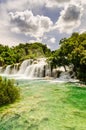 Waterfalls of Croatia.Tourists swimming near waterfalls in crystal clear water. Tourist spot in Dalmatia Krka National Park, place