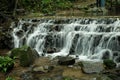 Waterfalls flowing down from the stream at `Mae Kampong` waterfall in Chiangmai, Thailand Royalty Free Stock Photo