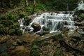 Waterfalls flowing down from the stream at `Mae Kampong` waterfall in Chiangmai, Thailand Royalty Free Stock Photo