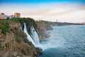 Waterfalls on Mediterranean sea coast in sunset light. Antalya, Turkey Royalty Free Stock Photo