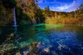 Waterfalls in national park falling into turquoise lake. Plitvice Croatia Royalty Free Stock Photo