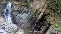 Waterfalls in a small canyon with stone walls. Beautiful cascade in the mountains. river in the Carpathians in the mountain autumn Royalty Free Stock Photo