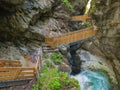 Waterfalls Stanghe Gilfenklamm localed near Racines, Bolzano in South Tyrol, Italy. Wooden bridges and runways lead through the