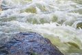 Waterflow. Water flowing over the rock. Mountain river Royalty Free Stock Photo