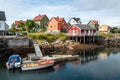 Waterfront with boat and wooden houses, Lofoten, Norway Royalty Free Stock Photo