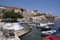 The waterfront with boats moored, on the charming Greek island of Symi