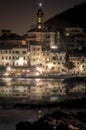 Waterfront in Bogliasco at night with reflections