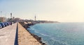 The waterfront of Cadiz city in Spain with a view of the boardwalk along the sea in Sunny day. The horizontal frame. Royalty Free Stock Photo