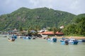 Waterfront Cai river in the vicinity of Nha Trang. Fishing boats moored near the shore. Vietnam Royalty Free Stock Photo