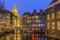 Waterfront canal houses at twilight Amsterdam