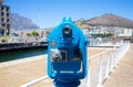 Creative shot of aesthetically pleasing, blue, coin operated lookout scope.