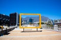 Large yellow Table Mountain frame standing in the Silo District in Cape Town.