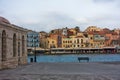 Waterfront at the city of Chania with old Venetian harbor near Kucuk Hasan mosque, island of Crete