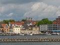 Waterfront cityscape featuring an array of small vessels in Kappeln, Germany