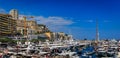 Waterfront cityscape, luxury buildings and yachts in Monte Carlo marina, Monaco