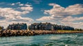 Waterfront condos and a jetty in Point Pleasant Beach, New Jersey. Royalty Free Stock Photo