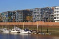 Waterfront of the Europa harbor in Bremen, Germany with moored sailing yachts and modern office and luxury apartment buildings Royalty Free Stock Photo