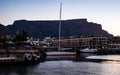 Boat in harbour with Table Mountain