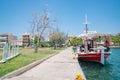 Waterfront with hashtad Itea on grass beside promenade Royalty Free Stock Photo