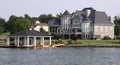 Waterfront Home with Boathouse Royalty Free Stock Photo