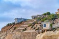 Waterfront homes on mountain with cloudy sky background in San Diego California Royalty Free Stock Photo