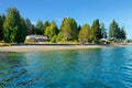 Waterfront house in Northwest with water and fall beach. Royalty Free Stock Photo