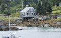 Waterfront house on stilts in Maine Royalty Free Stock Photo