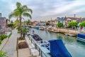 Waterfront houses boats and canal in dreamy Long Beach California neighborhood Royalty Free Stock Photo