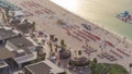 Waterfront overview Jumeirah Beach Residence JBR skyline aerial timelapse with yacht and boats