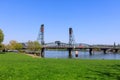 Waterfront Park with Hawthorne Bridge on the Willamette River in downtown Portland, Oregon Royalty Free Stock Photo