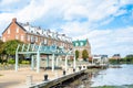 Waterfront path lined with metal and stylish gazebos