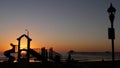 Waterfront playground. Children play, sunset ocean beach. Beachfront recreation area. California USA Royalty Free Stock Photo