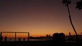 Waterfront playground. Children play, sunset ocean beach. Beachfront recreation area. California USA