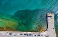 waterfront port Mandraki Rhodes island, clear turquoise water, rocks and bottom in clear water, top view, bird's eye view Royalty Free Stock Photo