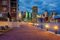 The Waterfront Promenade and Baltimore skyline seen at the Inner Harbor, in Baltimore, Maryland