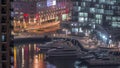 Waterfront promenade in Dubai Marina aerial night timelapse. Dubai, United Arab Emirates Royalty Free Stock Photo