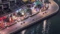 Waterfront promenade in Dubai Marina aerial night timelapse. Dubai, United Arab Emirates Royalty Free Stock Photo