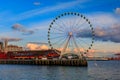 Waterfront skyline with the Great Wheel, the Puget Sound at sunset, Seattle, WA Royalty Free Stock Photo