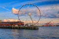 Waterfront skyline with the Great Wheel, the Puget Sound at sunset, Seattle, WA Royalty Free Stock Photo