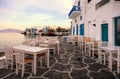 Waterfront tables, Mikonos Island, Greece Royalty Free Stock Photo