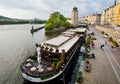 Waterfront with tourist ship moored to the shore Royalty Free Stock Photo