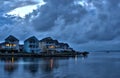 Waterfront vacation homes at at dusk Royalty Free Stock Photo