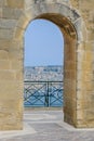 Waterfront views through arched passageway Royalty Free Stock Photo