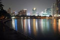 Waterfront walkway and colored light night Royalty Free Stock Photo