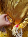 Watering Buddha In the Songkran festival